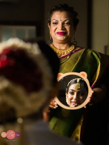 A creative and heartwarming portrait of Aashna and her mother, seen through a reflection. A beautiful tribute to the mother-daughter bond.