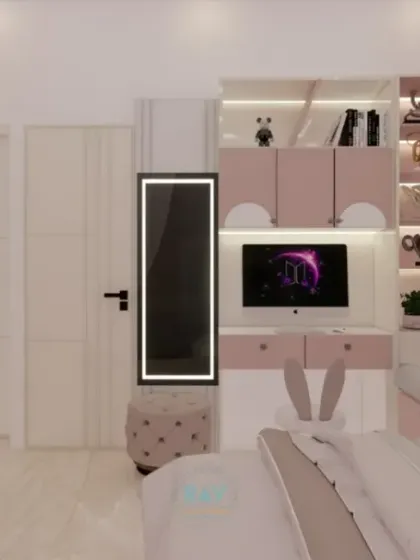 The study and vanity area in the pink kids' room, complete with a bunny-eared chair and a full-length mirror.