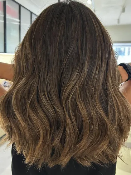 Summer beach blonde highlights on a one-length textured lob. I added invisible layers to create movement without sacrificing the clean line of the cut.