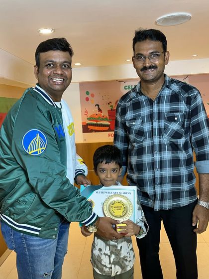 Presenting an award to Rudransh for his hard work and success in the abacus program at our prize distribution event.