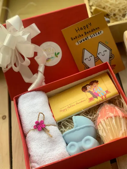 I can customize each gift box to your preference. This Raksha Bandhan set features a baby-stroller soap, showing the variety of molds I can use to create the perfect personalized gift for your family.