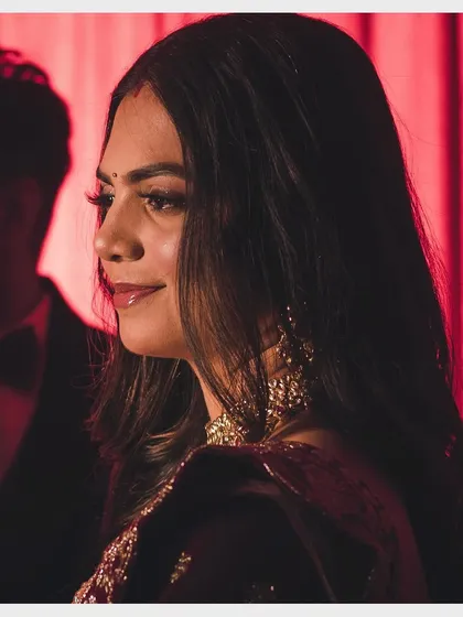 Makeup that looks like skin in every angle and every light. This side profile of Aditi at her reception showcases the seamless blend and natural finish of her glam look.