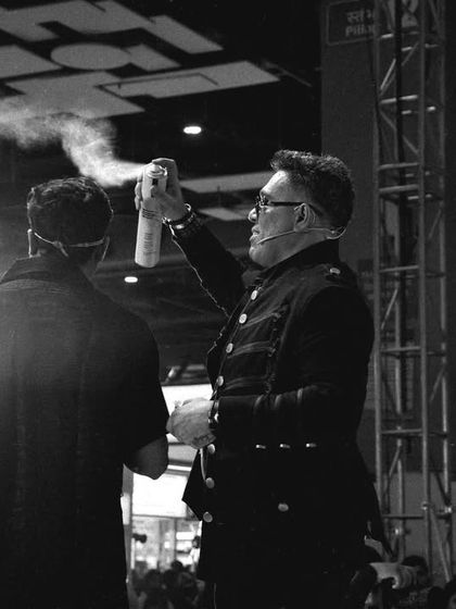 A dramatic shot from my presentation at Professional Beauty Delhi 2025. Sharing my passion and knowledge with other artists is a huge part of what I do.