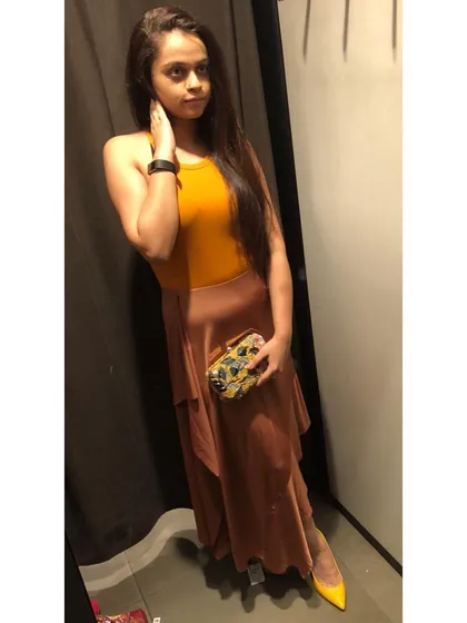 This look was created for a party with a monochrome theme. I used different tints and shades of tan and mustard, from the top and skirt to the clutch and heels, to create a harmonious and trendy party ensemble.