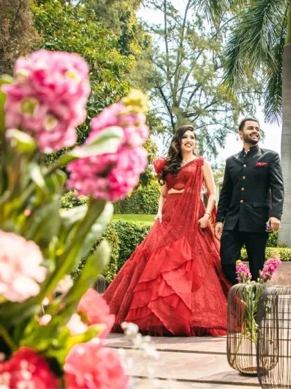 This bride is regal in red for her engagement. The makeup is luxurious and glamorous, with sultry brown smokey eyes and a classic rose-toned lip.