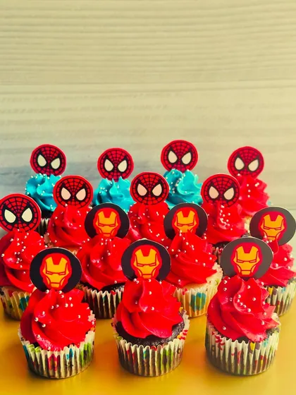 A closer look at the Spiderman and Iron Man themed cupcakes from a recent order. The bold red buttercream and detailed paper toppers make these instantly recognizable and exciting for any young superhero fan.