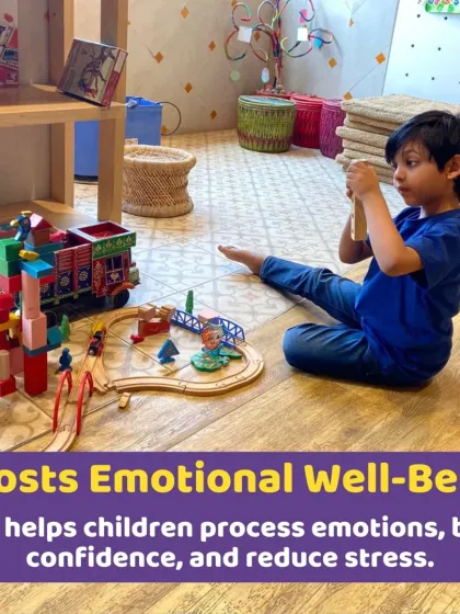 A boy engrossed in creating a world with his wooden train set and blocks. This kind of open-ended play is crucial for boosting emotional well-being and reducing stress.