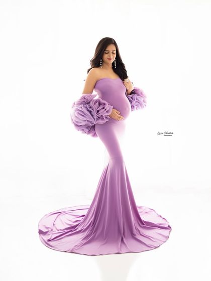 This beautiful lavender gown is a soft and romantic choice from my client closet. The full train and floral sleeves create a stunning, elegant silhouette.