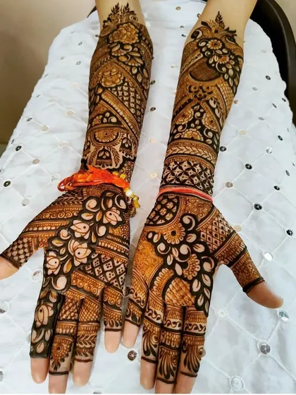 A beautiful floral design with a mix of different flower types and patterns, perfect for a spring or summer wedding.