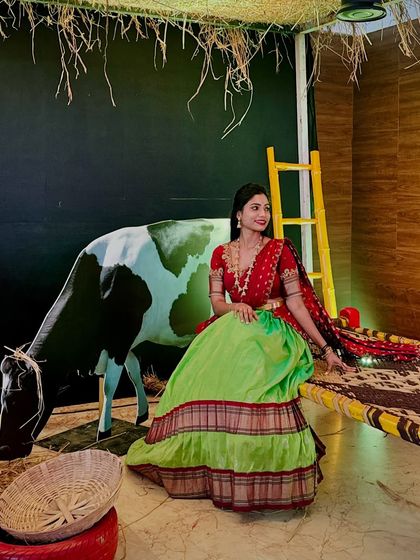 A fun and festive shot from the "Halli Habba" event. The langa voni is perfect for such traditional themes.