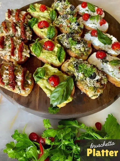 My Bruschetta Platter is perfect for sharing. This board features an assortment of toppings, including avocado mash, pesto, and cream cheese with sun-dried tomatoes, all beautifully arranged.