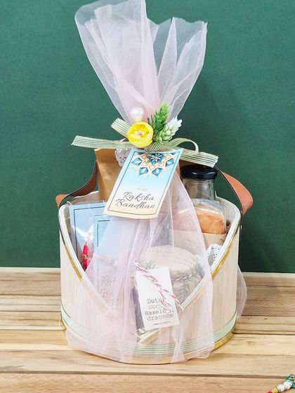 A beautifully wrapped hamper from our Rakhi Collection 2025, designed to bridge any distance with love and delicious treats.