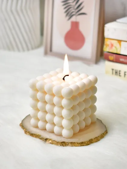 Relax and unwind with our favorite bubble candle. The gentle flame and unique shape create a perfect, calming ambiance.