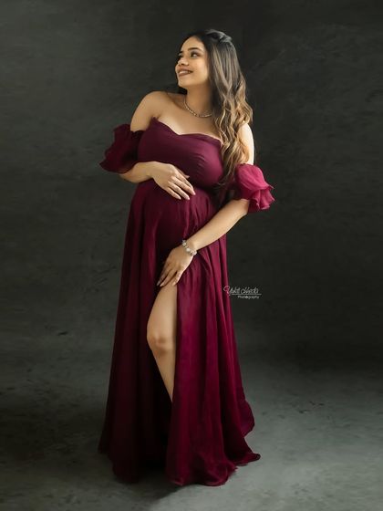 Feeling beautiful and confident in this gorgeous off-shoulder gown. A solo portrait is a wonderful way to celebrate your own strength and beauty during this special time.