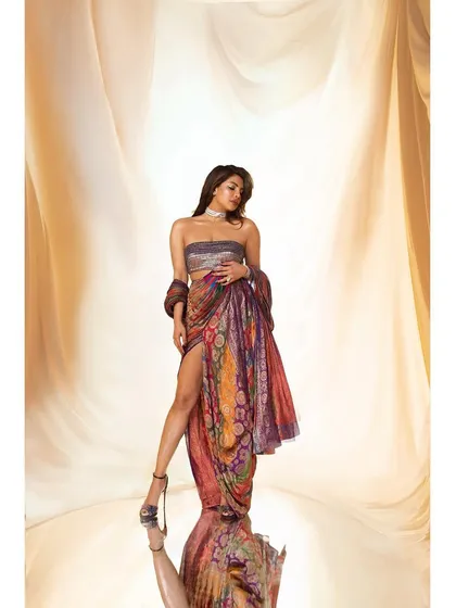 A variation of the studio portrait of Priyanka Chopra. The subtle shift in her pose and gaze offers a different emotional tone, showcasing the versatility we can achieve within a single styling concept.