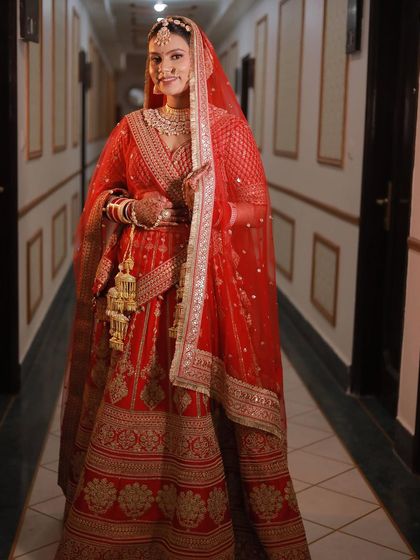 A full-length shot of this happy bride. She looks so confident and beautiful from head to toe.