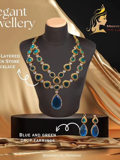 A detailed look at the two-layered green stone necklace, paired with blue and green drop earrings. This image highlights the specific components of this elegant set.