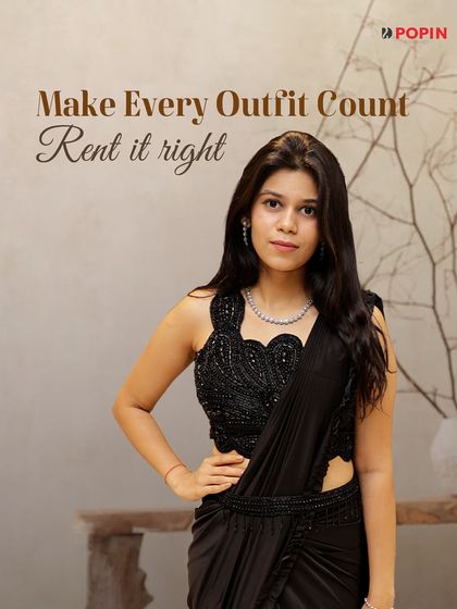 Black makes a statement. This pre-draped black saree with a heavily embroidered blouse is the perfect rental for a sangeet or cocktail night when you want drama and elegance.