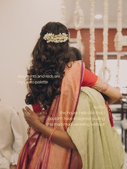 A tender hug between family members at an at-home wedding. This image is from our 'GHAR' coffee table book, which celebrates the comfort and intimacy of home-based celebrations.