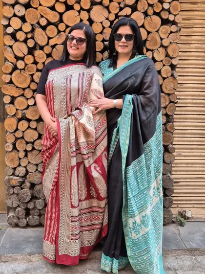 Posing with my dearest friend, Marina. We both chose to wear beautiful sarees for our meetup, celebrating our friendship and our shared love for this timeless garment.