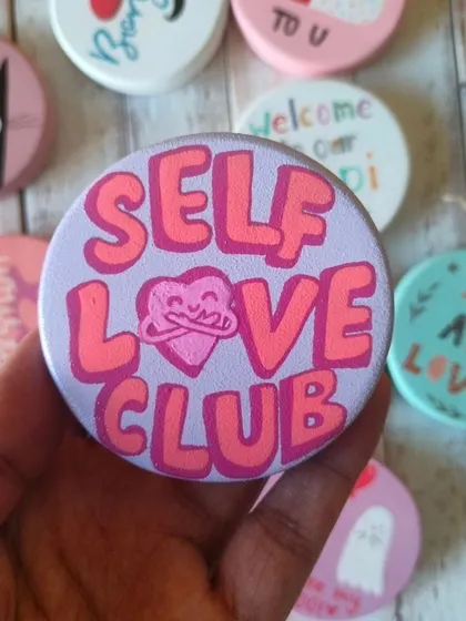 Join the "Self Love Club" with this vibrant, hand-painted magnet. A great reminder to always be kind to yourself.
