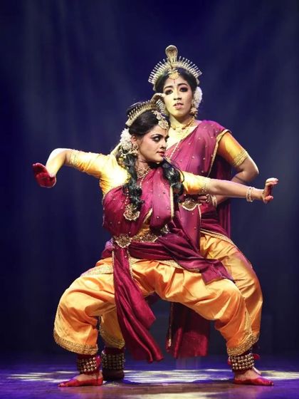 A strong, balanced pose from "Shrishti Stithi Laya". The symmetry and power in this formation reflect the cosmic balance that is a central theme of the production.