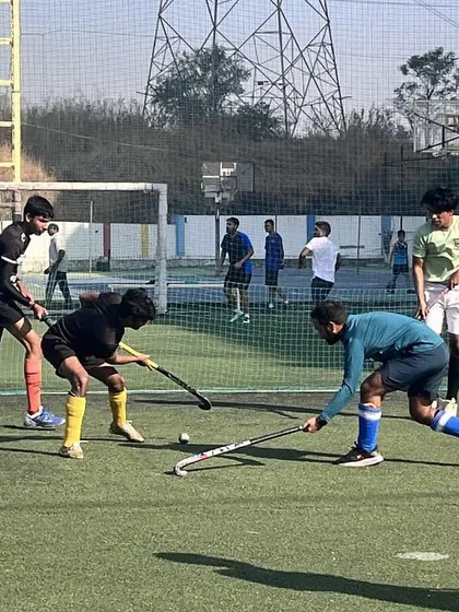 A close-up of a tackle during a practice match. We teach our players to be strong and decisive in their defensive plays.