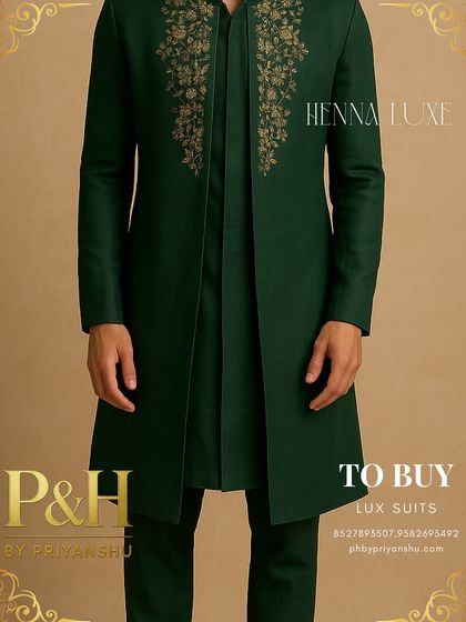 A detailed view of the dark green jacket set, focusing on the intricate hand-embroidery and the layered effect of the open kurta.