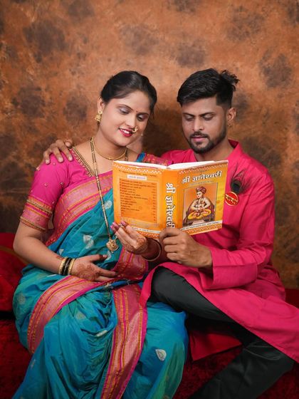 This is the same couple from the video, showing the final photo from their maternity shoot. We provide outfits for both partners to create a cohesive look.