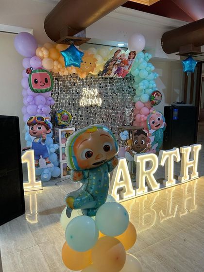 A closer look at Parth's Cocomelon party, with a JJ balloon figure ready to celebrate.