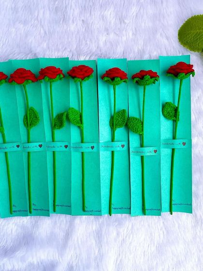 Each of the seven red roses, individually packed on a green card. I love preparing each order with special care and attention.