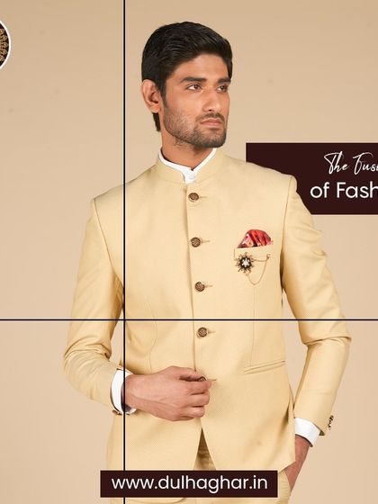 The fusion of fashion. A close-up on a cream Bandhgala, highlighting the pocket square and brooch details.