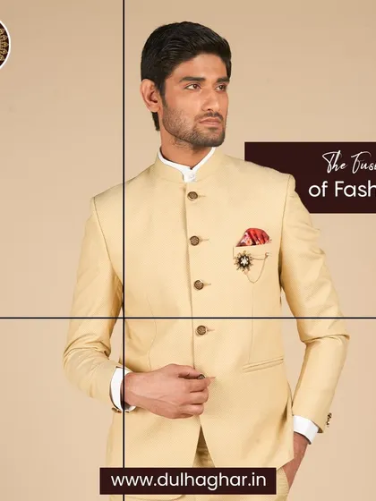 The fusion of fashion. A close-up on a cream Bandhgala, highlighting the pocket square and brooch details.