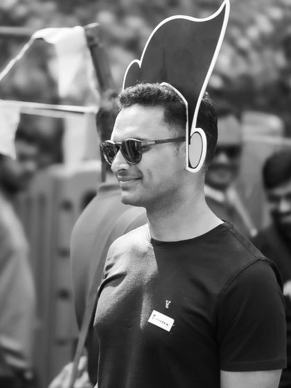 Having fun with our custom photo props at the Garage Sale. It’s all about creating memorable moments.