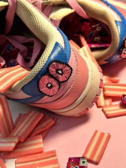 The heel of the Boomer custom, where I embroidered the "OO" from the logo. I love mixing different mediums like paint and embroidery.