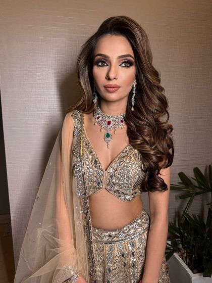 Another angle of this ethereal smokey glam. The look is bold and snatched, perfect for a bride who wants to make a statement at her cocktail party.