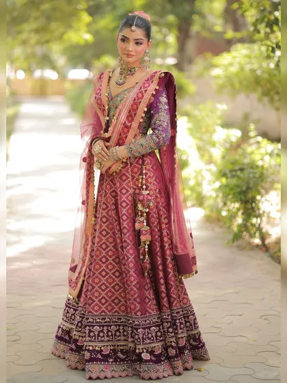 Another angle of the multi-colored silk lehenga, showing how the different colors and patterns come together to create a harmonious and stunning outfit.