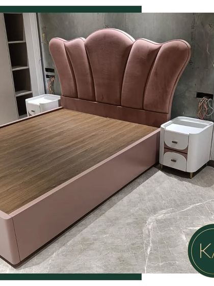 A whimsical yet elegant bed designed for a client in South City 1. The scalloped, crown-like headboard is upholstered in a soft pink velvet, creating a fairytale-like centerpiece for a dreamy bedroom retreat.