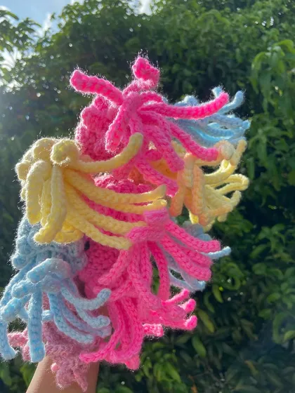 A vibrant bunch of my jellyfish keychains in bright pastel colors. The dangling tentacles add a fun, playful element to this design.