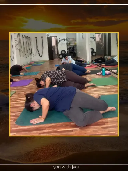 A class practices a restorative side-lying twist, a wonderful way to unwind at the end of a session.