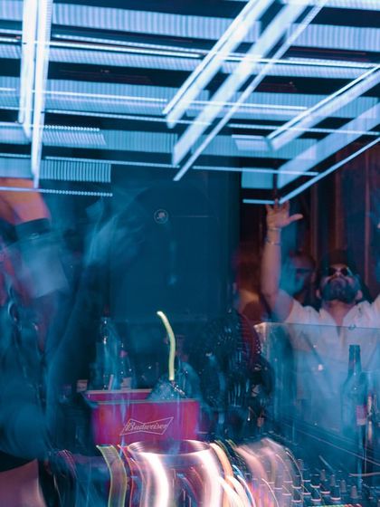 The crowd at The Kai Room, lost in the music and the lights. This is the kind of immersive experience I aim to create.