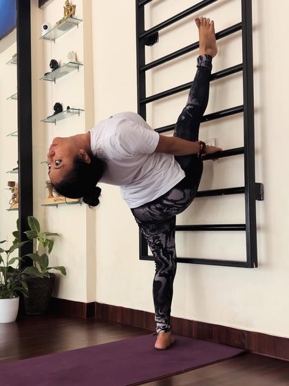 Splits in any form is one of my favorites. Using the stall bars in my studio to achieve a deep standing split and backbend.