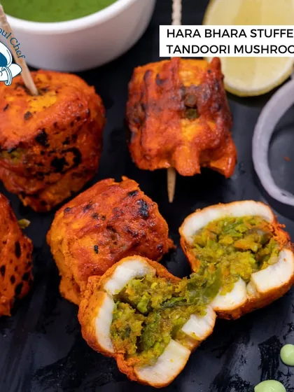 A vegetarian showstopper. My Hara Bhara Stuffed Tandoori Mushrooms are marinated in tandoori spices and stuffed with a flavorful green pea mixture, offering a smoky and savory experience.