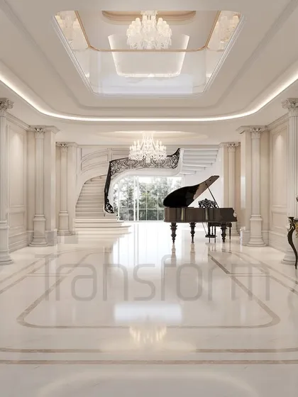 A grand foyer designed as a prelude to the extraordinary. The classical Corinthian columns, sweeping staircase, and a grand piano under a double-height ceiling create a symphony of light, space, and timeless elegance.