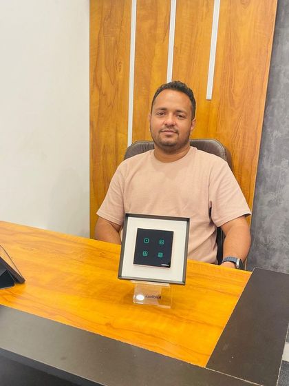 Architect Jeevan with our smart keypad at his desk. We are excited to be a part of the growing smart home movement in Kerala.