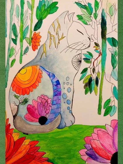 This peaceful cat seems to be dreaming of a lush garden. The student has filled the cat's body with a vibrant, imaginative landscape, a creative twist on the project.