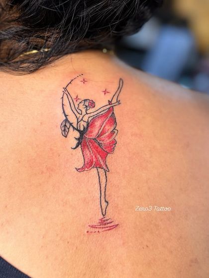 Another shot of the dancer tattoo, showing the subtle red coloring.