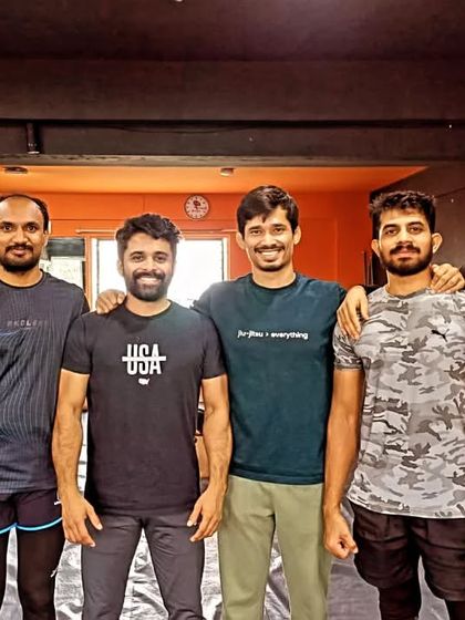 A group photo of Team Ippon members after competing in an in-house grappling tournament. These events build skill and strengthen our community.