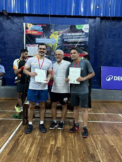 Another shot of our winning coaches at the district tournament. Their experience in competitive play is an invaluable asset for our students.