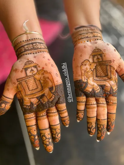 I have a special love for traditional bridal motifs. This design features a classic doli and elephant, symbolizing the beautiful journey the bride is about to begin. The details are everything.